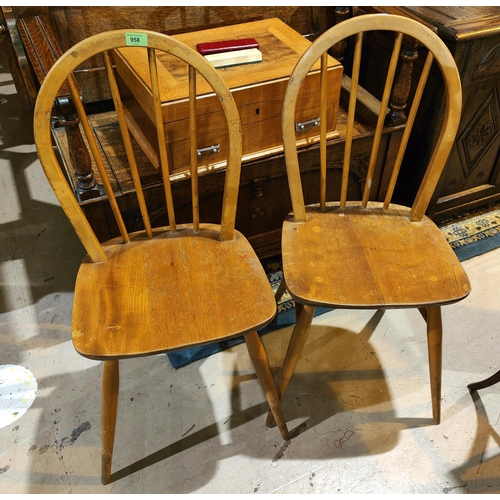 958 - A set of Ercol style elm and beech hoop and stick back chairs