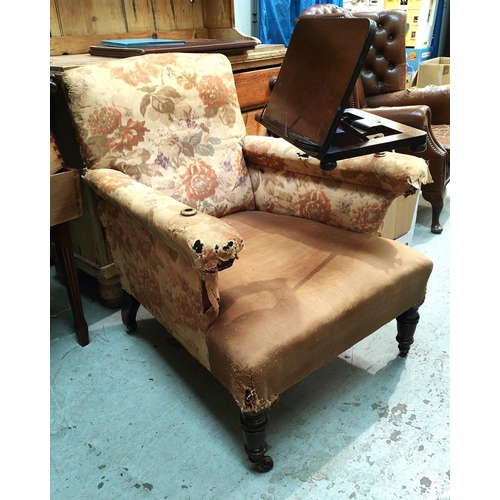 992 - A Victorian gentlemans armchair with unusual brass and mahogany fitted adjustable book arm, in need ... 