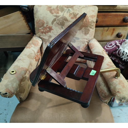 992 - A Victorian gentlemans armchair with unusual brass and mahogany fitted adjustable book arm, in need ... 