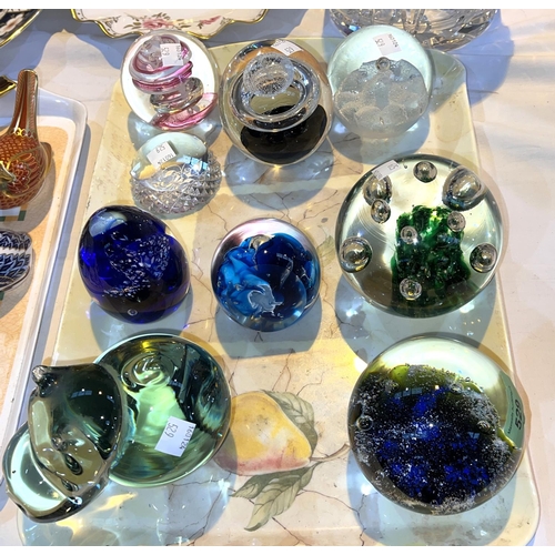 529 - A collection of 9 modern glass paperweights by Caithness; Mdina; etc.