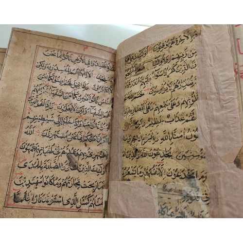 195F - A hand written Quran Arabic text backed on later pages, and another later printed example