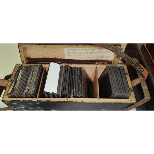 61 - A selection of magic lantern slides in wooden box