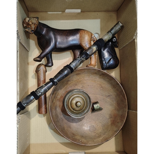 63 - An Egyptian horn walking stick, a covered copper pot, carved wooden bowl, lion and cat