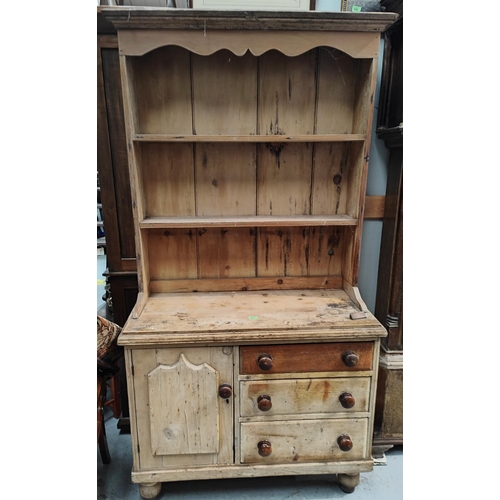 917 - A Victorian stripped pine Welsh dresser with single cupboard, three drawers and two height back, ht.... 