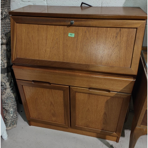 970 - A 1970's teak fall front bureau with drawer and double cupboard under