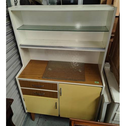 976 - A mid 20th century kitchen unit with formica top, sliding shelves above, cupboard and drawers below