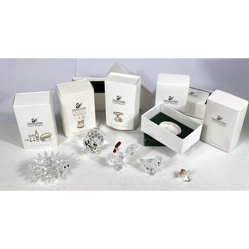 580 - Swarovski: a selection of Swarovski boxed animals, rooster, hedgehog and 'Crystal Memories' (11 in t... 