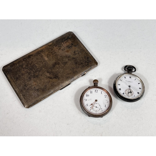 664 - An engine turned hallmarked silver cigarette case, Chester 1931 6oz; 2 gents pocket watches (a.f)