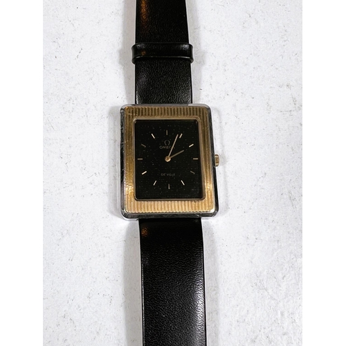 736 - An OMEGA DE VILLE c. 1975, rectangular dial inset with 14ct gold bezel, deep brown dial, movement ca... 