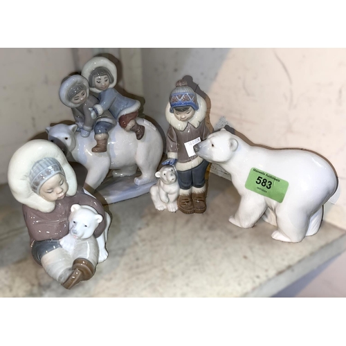 583 - Lladro: ceramic group of children riding a polar bear, 5353, a polar bear and two children with pola... 