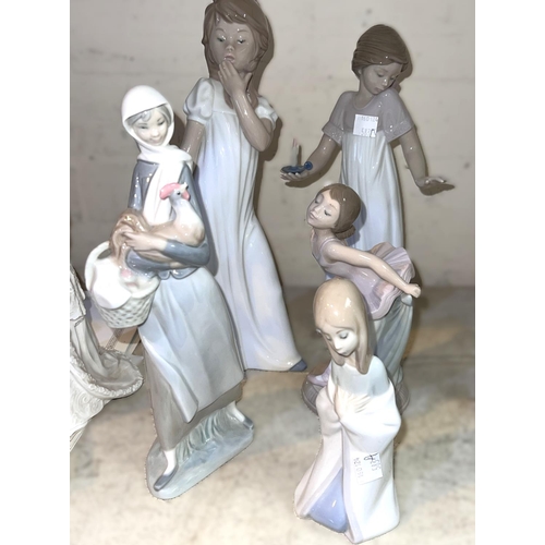 583A - Three Nao figures, ballerina, yawning girl, girl with candle and two Lladro figures