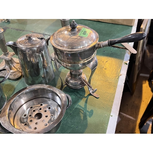 658 - A silver plated brandy warmer on burner base; a pair of 5-branch candelabra; other silver plate