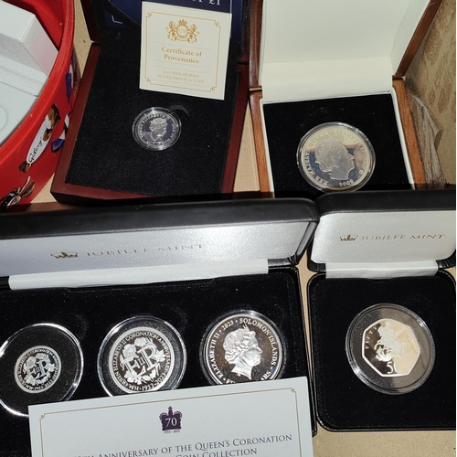 342 - SOLOMON ISLANDS - $1, $ & $5 set fine silver,  an IOM silver proof £1, a £5 Britannia 2009 and s... 