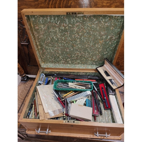 191H - A large light oak collectors box set up for pens and contents, pens and pencils