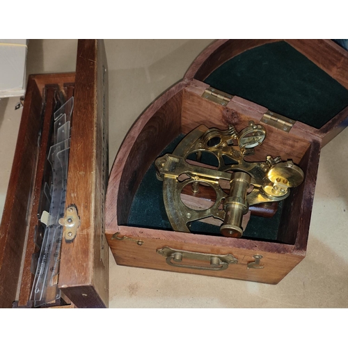 232 - A brass marine sextant, cased, by Sestrel of London; a 1/2500 transition set, cased