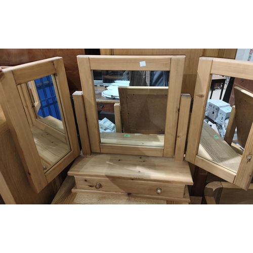 888 - A pair of pine bedside cabinets; a pine framed free standing mirror