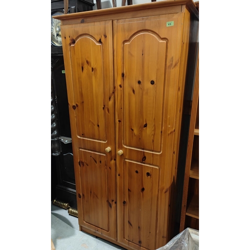 916 - A modern pine double door wardrobe in Ducal style, ht. 184 x 91cm and a three height chest