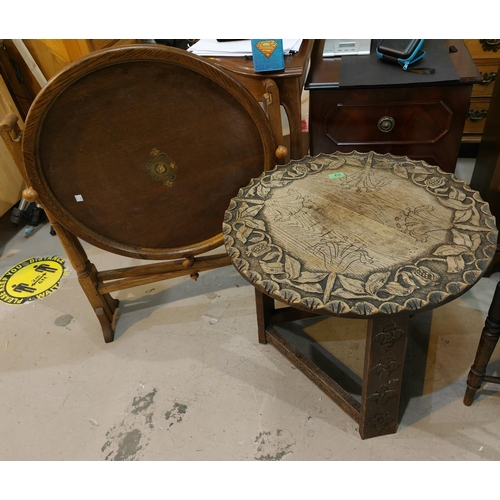 919 - A carved oak circular occasional table with floral decoration, 'An Oak folding Revertible' and a rep... 