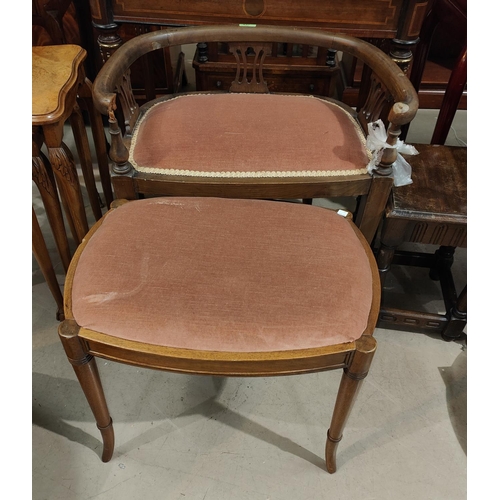 937 - An Edwardian mahgany piano chair; a dressing stool