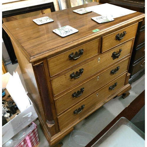 938 - A late 19th/early 20th century mahogany bachelor's chest in the Georgian style, the 3 long and 2 sho... 