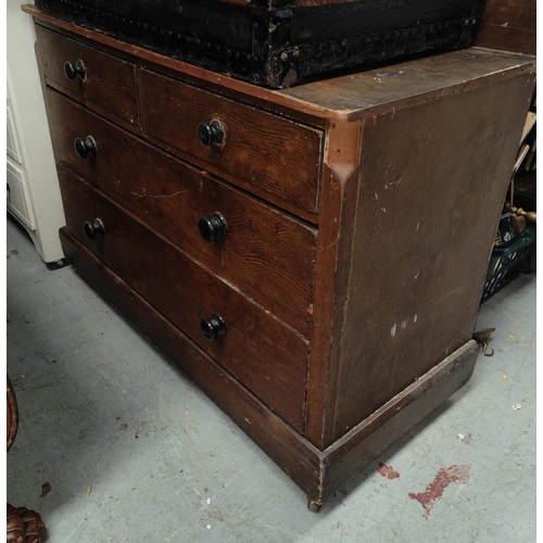 977 - An oak chest of drawers and a low chest of two short and one long drawer