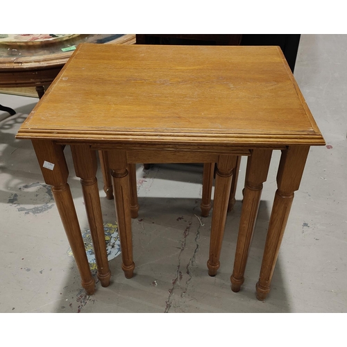 981 - Two oak occasional tables, a modern nest of tables and a mirror