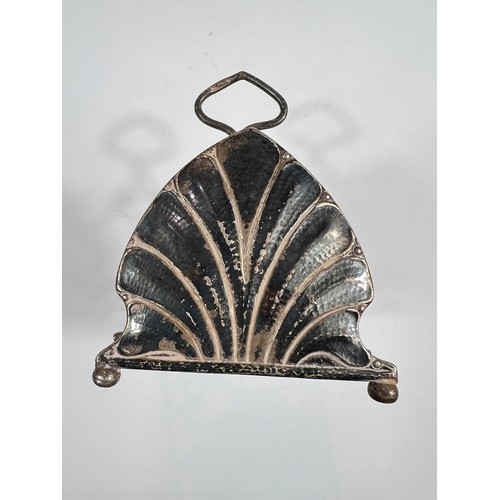 641 - GUILD OF HANDICRAFTS,  a silver toast rack with palette shaped ends, London 1906, 3oz (a/f)