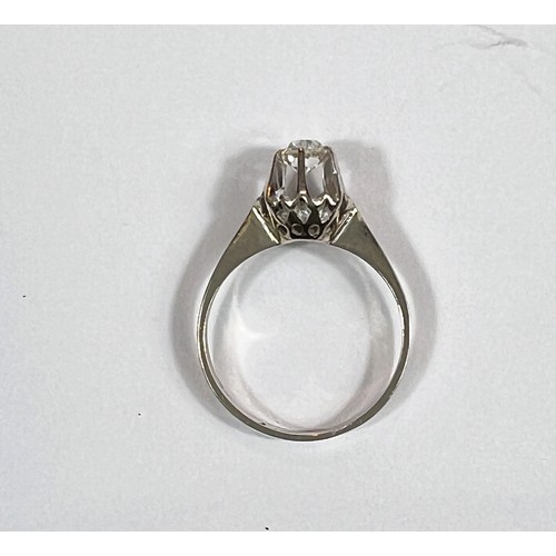 756 - A yellow metal diamond solitaire stamped 750, illusion set with a diamond in raised claws. 2.1 gm. S... 