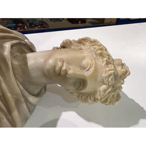 87 - A carved marble classical style head and shoulders bust of a woman, replacement base, 34cm