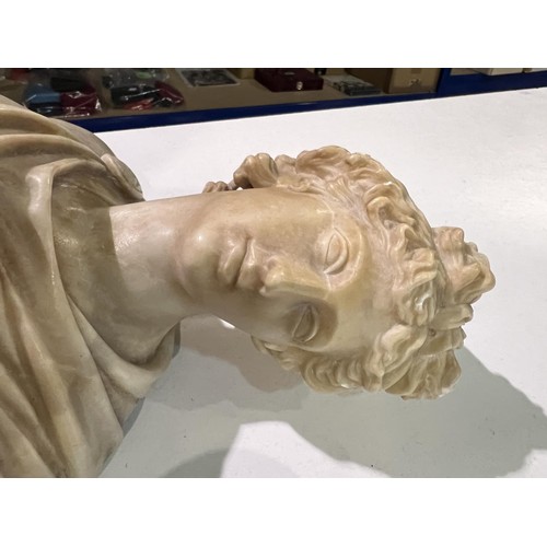 87 - A carved marble classical style head and shoulders bust of a woman, replacement base, 34cm