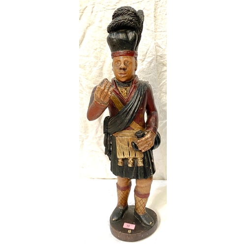 10 - A 19th century tobacconist's sign in the form of a kilted Scot taking snuff, height 76cm