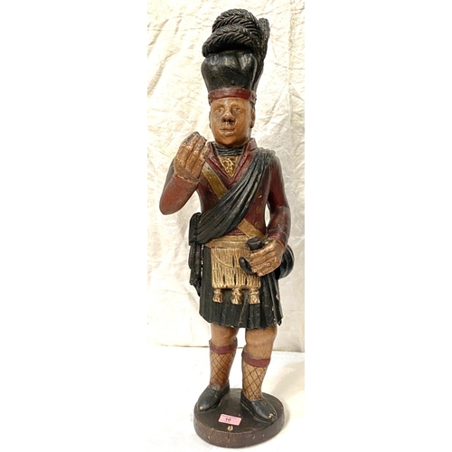 10 - A 19th century tobacconist's sign in the form of a kilted Scot taking snuff, height 76cm