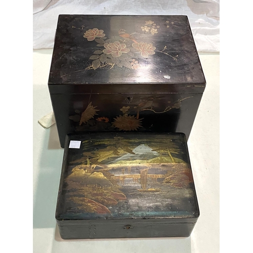 101 - Two 19th century Chinese black lacquer jewellery boxes; 2 oriental carved hardwood vase stands