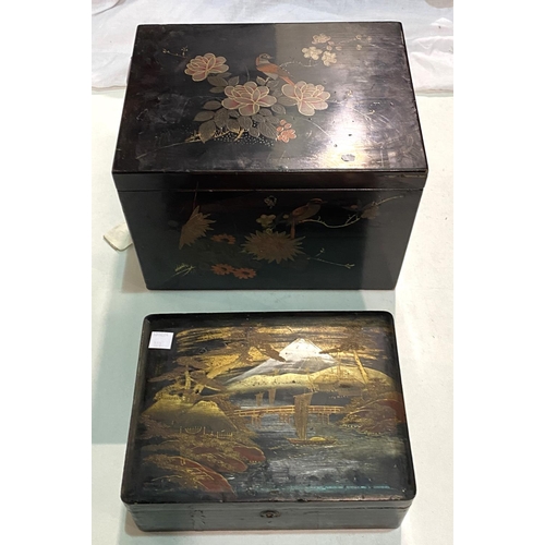 101 - Two 19th century Chinese black lacquer jewellery boxes; 2 oriental carved hardwood vase stands