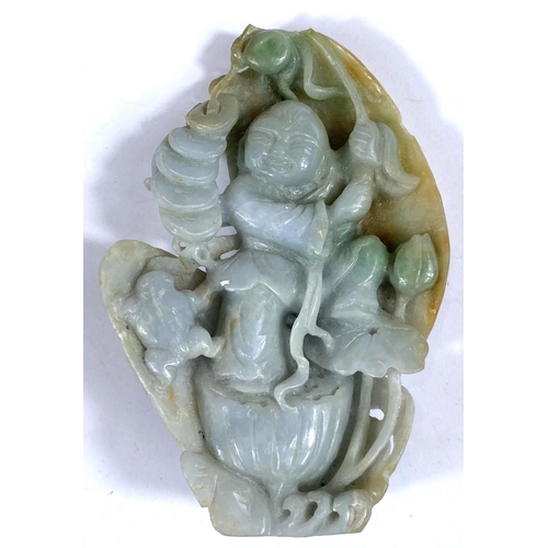 103 - A Chinese carving in jade coloured hardstone depicting a man holding a branch, with shells to rear, ... 