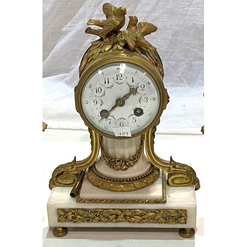 109 - A late 19th/early 20th century clock garniture, Louis XVI style in ormolu and white marble, the cent... 