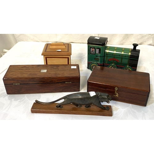 11 - Two mahogany boxes; wooden and metal ornaments