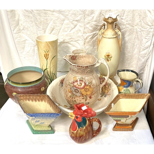 23 - A Victorian floral jug and bowl set; a Doulton style stoneware jardinière; Art Deco vases; et... 