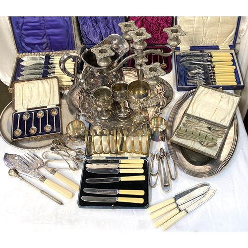26 - A selection of silver plate:  5-branch candelabrum; serving platters; cutlery; etc.