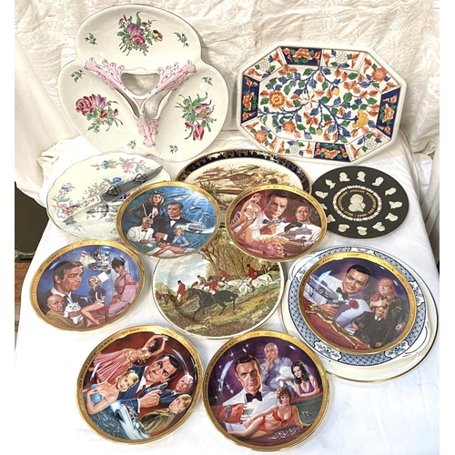 27 - A set of 6 collectors plates:  James Bond; 3 cheese plates in original boxes; a large trefoil h... 