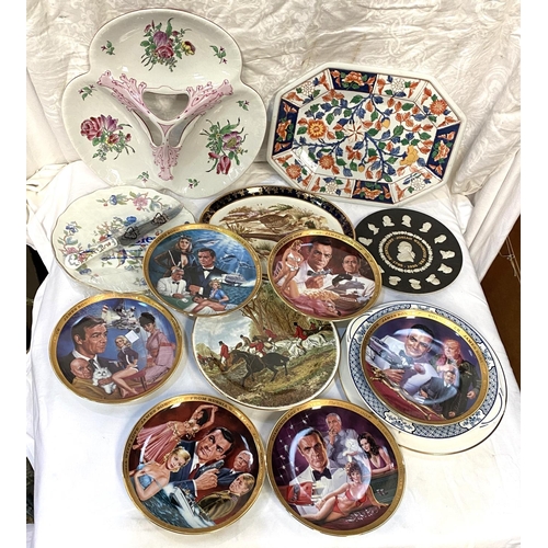 27 - A set of 6 collectors plates:  James Bond; 3 cheese plates in original boxes; a large trefoil h... 