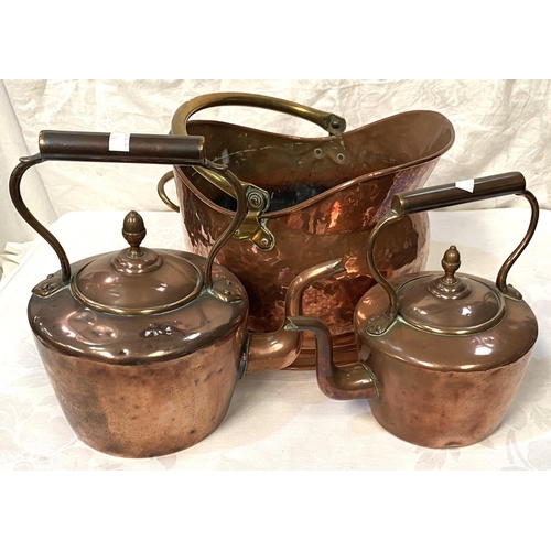 34 - A 19th century copper coal scuttle; 2 19th century copper kettles