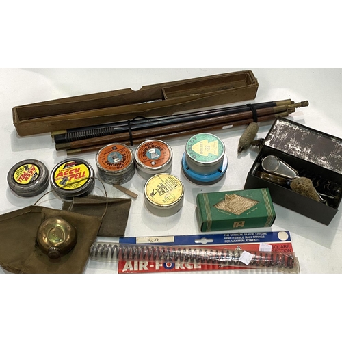 45 - A selection of gun cleaning rods and utensils; air gun pellets; etc.