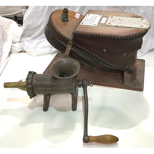 57 - A pair of large vintage foot bellows; an industrial mincer/sausage makerNo bids sold with next lot... 