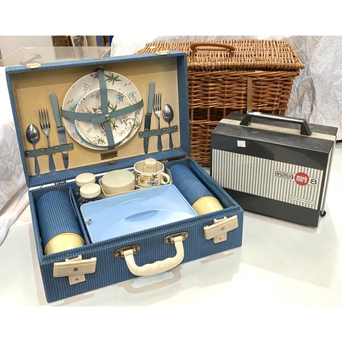 60 - A Brexton fitted picnic box; a picnic basket; a Eumig Mark 8 projector