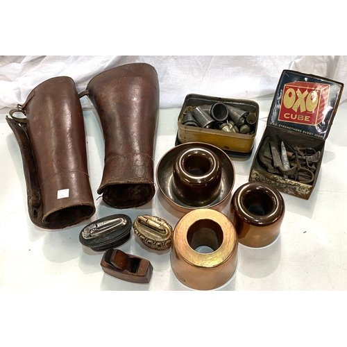 70 - A pair of 20th century leather garters, a miniature plane, tins with vintage piping nozzles etc; a s... 