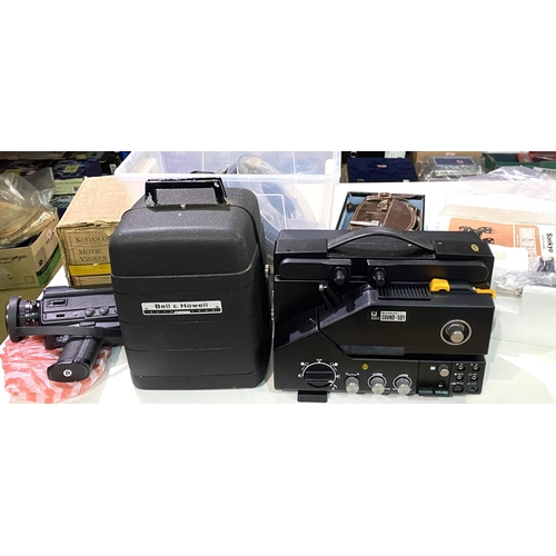 98 - A Bell & Howell Autoset 8mm film camera, boxed; a Bell & Howell boxed projector, two other c... 