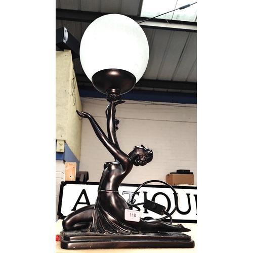 118 - An Art Deco style bronzed effect table lamp, girl with glass globe overall height including globe ap... 