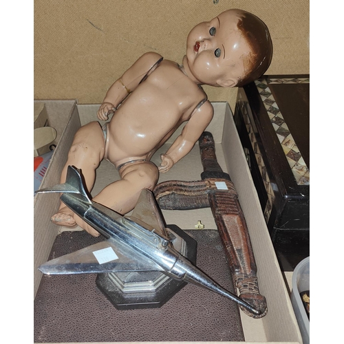 119 - An early 20th century doll with a composition head and body; a cased set of tea knives; an Eastern d... 