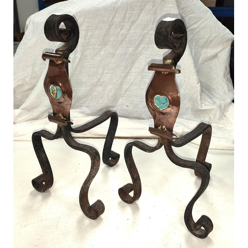 123A - A pair of Arts and Crafts firedogs in the Liberties, Archbold Knocks style with copper scroll, with ... 